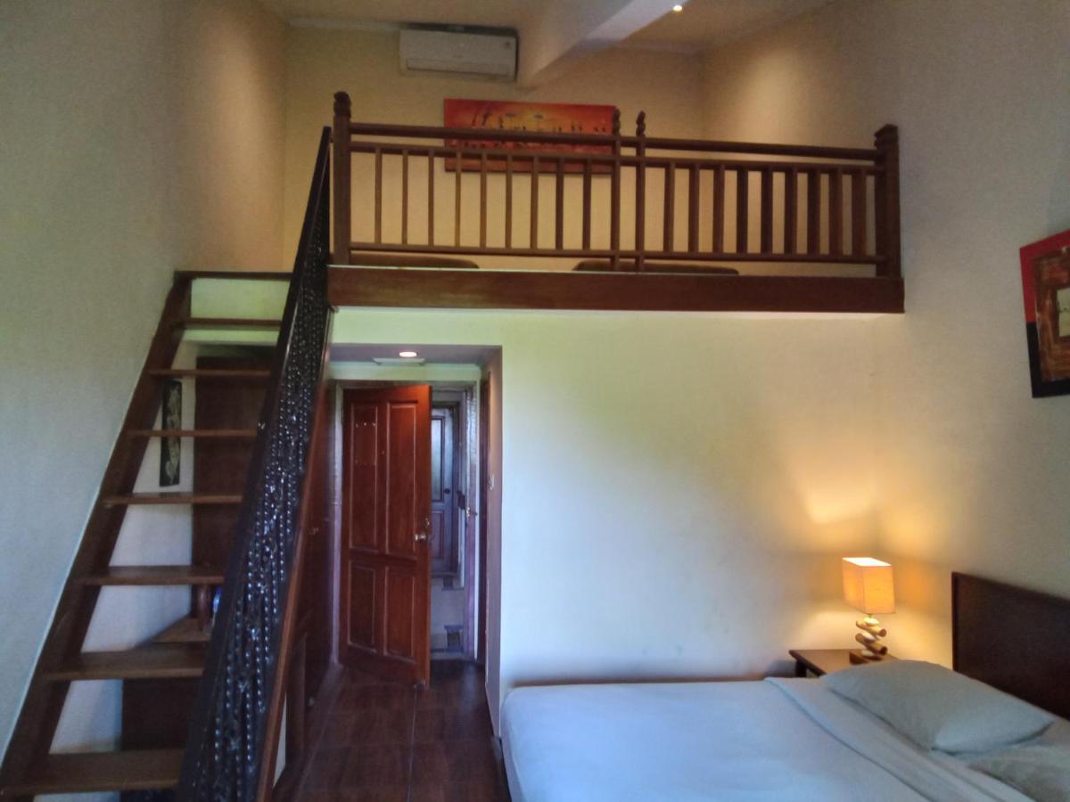 Hotel Puri Dibia Kuta กูตา ภายนอก รูปภาพ